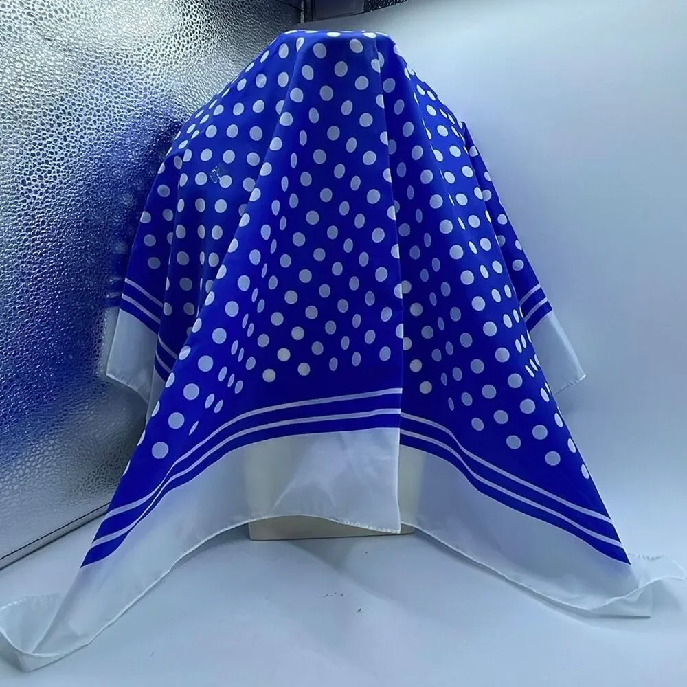 Vintage 26” X27” nylon hand rolled scarf. Water resistant.